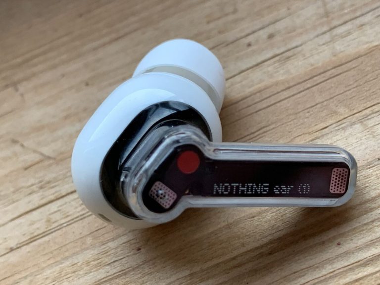AI Translation Earbuds Move Into Everyday Travel Use Wireless earbuds in their case