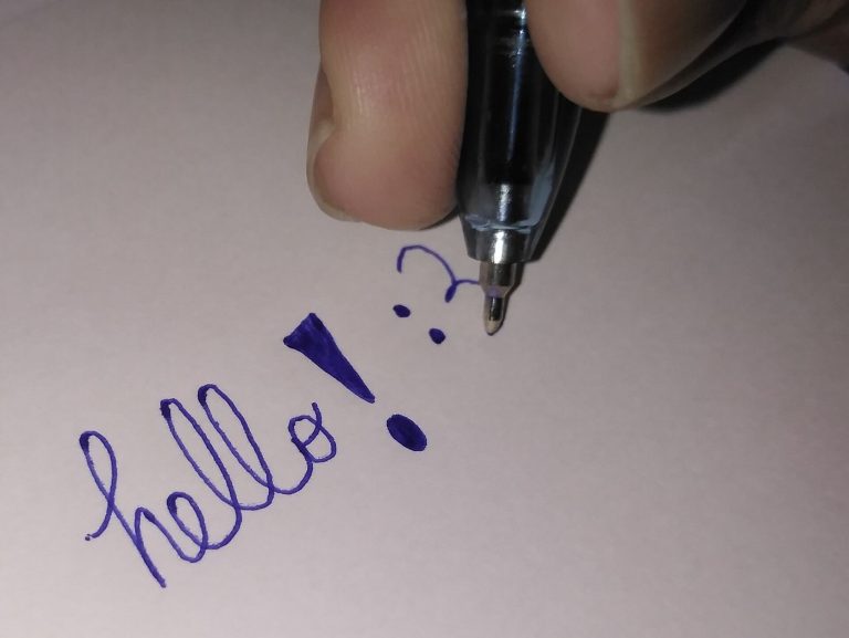 Reclaiming Attention: The Psychology of Deep Focus A person writing in a notebook at a tidy desk