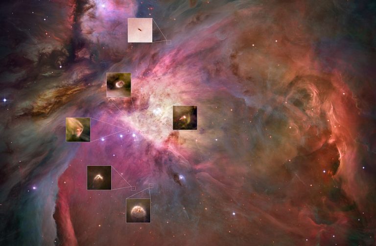 A space telescope image of stars and a colourful nebula